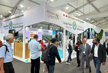 participants walking through the COP27 conference center
