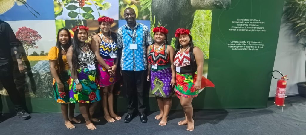Emmanuel with Indigenous people of the Amazon